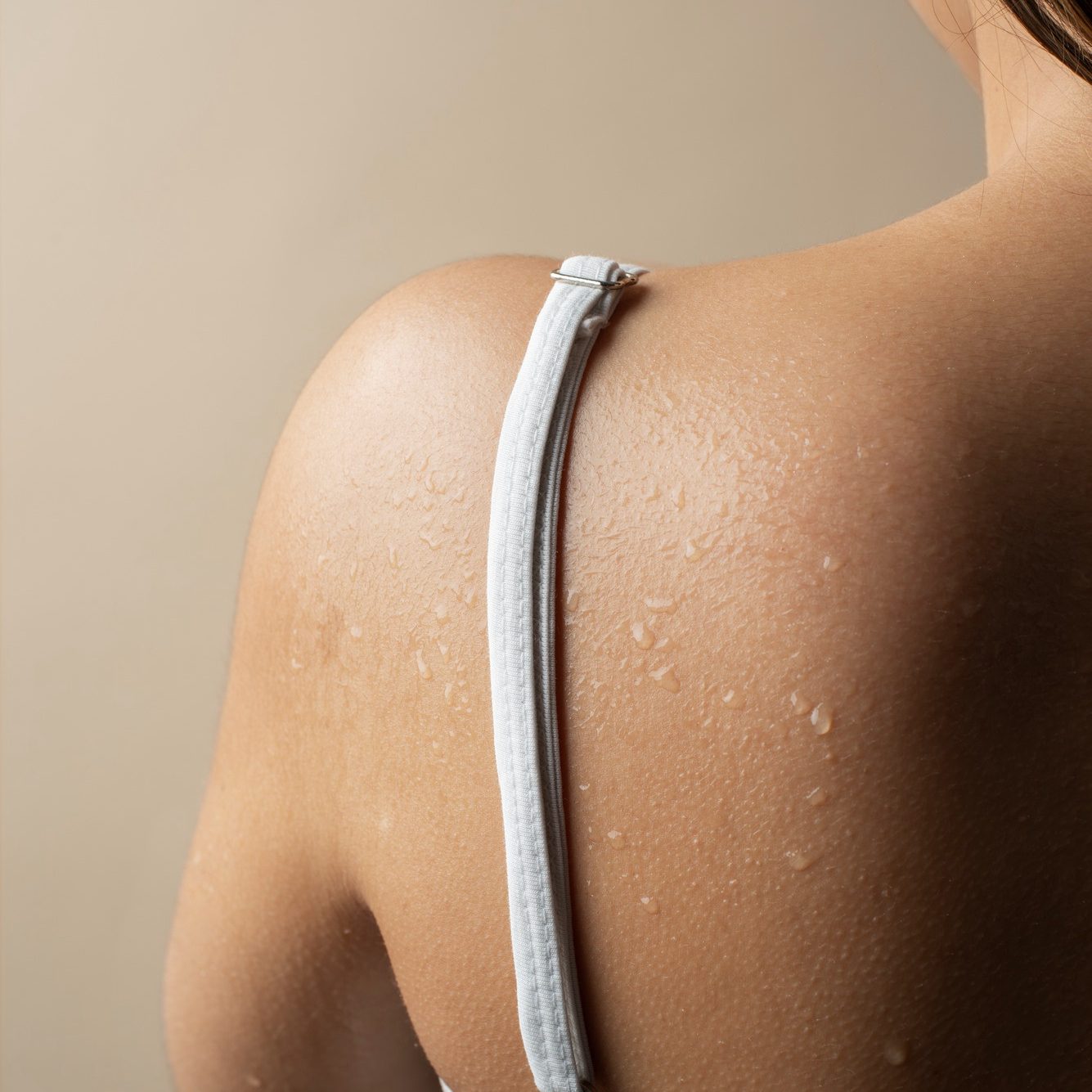 back-view-woman-with-hydrated-skin