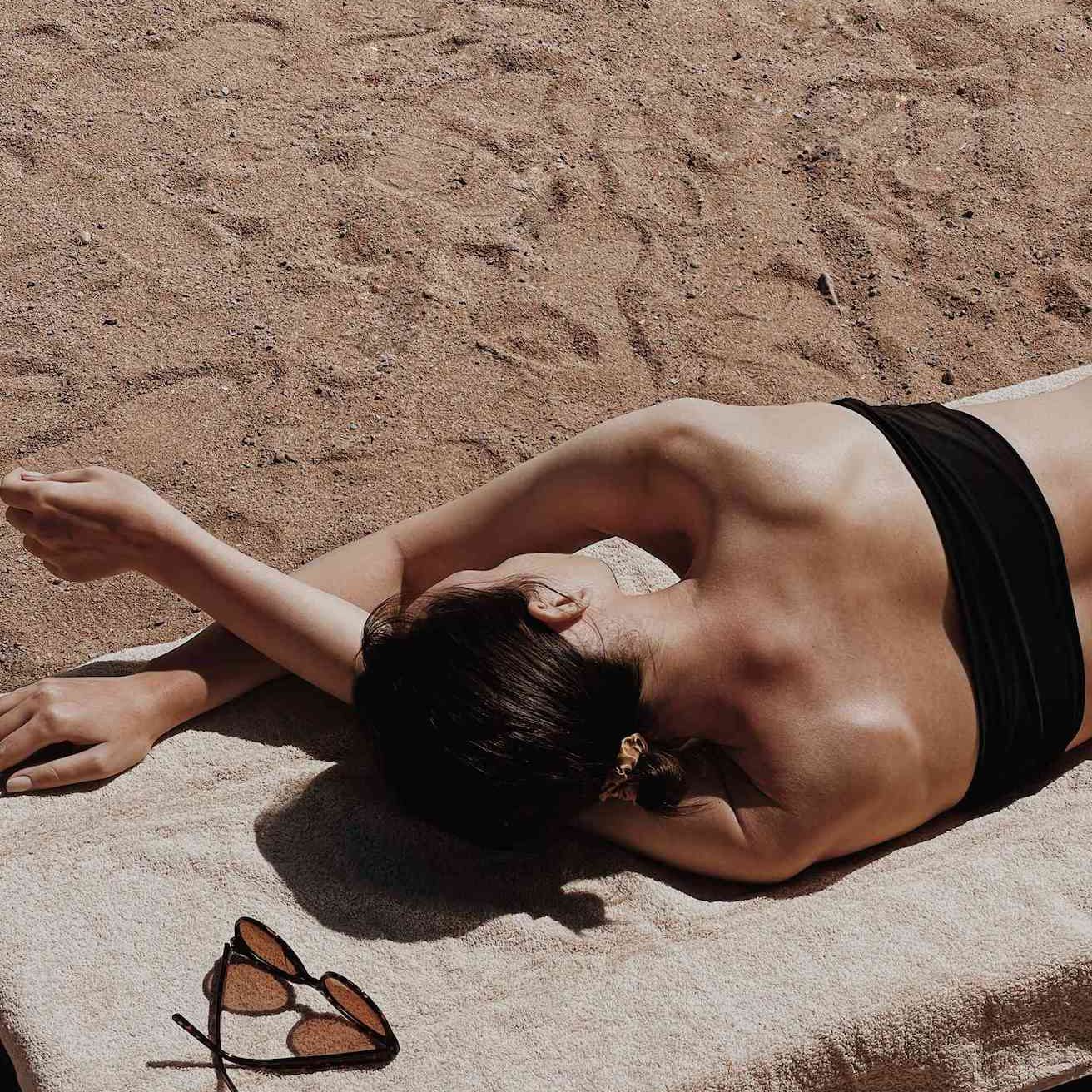 sun-woman-beach-brown